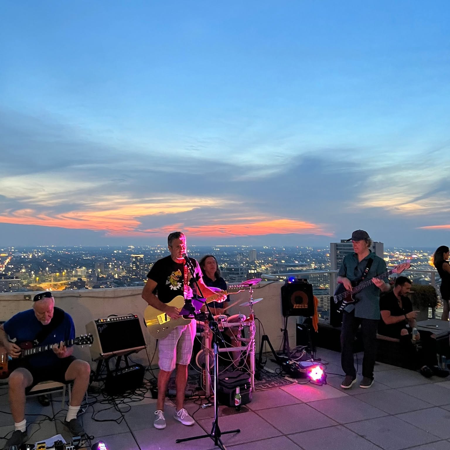 Rooftop show at sunset.
